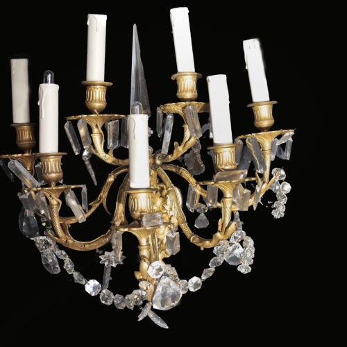 Paire d'appliques en bronze, poignard et pampilles
